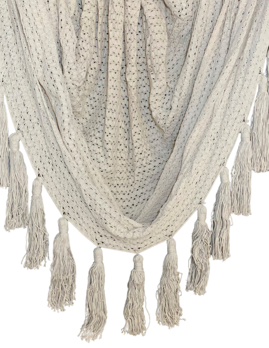 Courbe de tissu à pompons