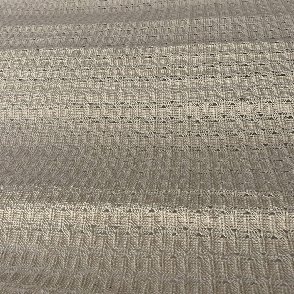 Courbe de tissu avec pompons